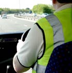 Image of a man driving a minibus.