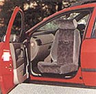 Picture of a swivel seat installed in a car.